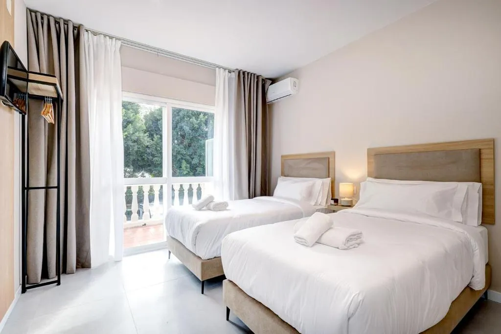 Twin Room with Terrace – Explore Hostal Puerta Almar: Your Oasis for Relaxation and Comfort